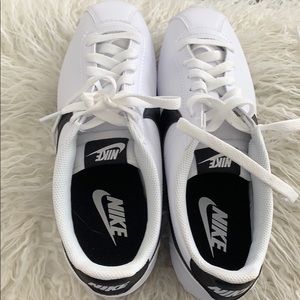 White and black nike shoe